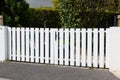 Classic slats white aluminum home gate portal of suburbs door house Royalty Free Stock Photo