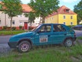 Classic small old compact city car green Skoda Felicia parked in a hot day in June, 2022 Royalty Free Stock Photo