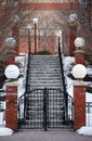 Classic Snow Covered Stairway and Lamp Pillars