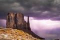 Classic southwest desert landscape with storm clouds and lightning sun in Monument Valley Royalty Free Stock Photo