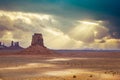 Classic southwest desert landscape under a dramatic sunset in Monument Valley in Arizona Royalty Free Stock Photo