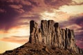 Classic southwest desert landscape under an evening sky and bright sun in Monument Valley Royalty Free Stock Photo