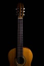 Classic spanish guitar on black background