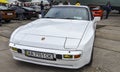 Classic sports car white porsche 944 S2 coupe 1988 at exhibition of historics, vintage transport