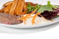 Classic steak and chips meal with home-made coleslaw and salad Royalty Free Stock Photo