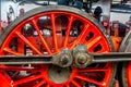 Classic steam engine red spoke wheel, detail Royalty Free Stock Photo