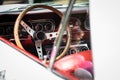 Classic steering wheel and interior of a vintage car