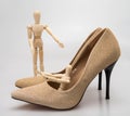 Classic stiletto high heels shoes in golden texture design. Royalty Free Stock Photo
