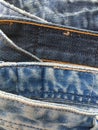 Classic stitching on blue retro jeans. Abstract composition. Royalty Free Stock Photo