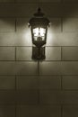 Classic streetlight on brick wall in monochrome Royalty Free Stock Photo