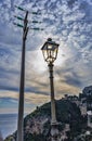 Classic streetlight with modern electric pylon Royalty Free Stock Photo