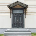 Classic style closed wooden entrance doors