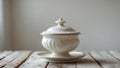 Classic sugar bowl with lid placed on a kitchen table Royalty Free Stock Photo