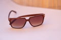 Classic sunglasses model shoot in a summer day closeup. Selective focus