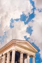 Classic temple with sky and clouds background for copy space Royalty Free Stock Photo