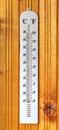 Classic thermometer on wooden board Royalty Free Stock Photo