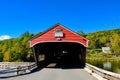 Classic timber built covered bridge seen in New England, USA.