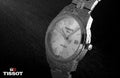 Classic tissot watch with water drops Royalty Free Stock Photo