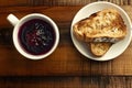 Classic toast and jam breakfast with ample space around plate for adding short message or logo Royalty Free Stock Photo