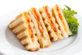 Classic tomato and cheese toasted sandwich on white plate Royalty Free Stock Photo