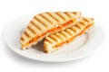 Classic tomato and cheese toasted sandwich on white plate Royalty Free Stock Photo