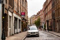 Classic traditional brick facades in London midtown. Paving stone architecture of United Kingdom Royalty Free Stock Photo