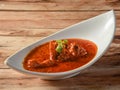 Classic Traditional Indian Lamb Dish, Mutton Rogan Josh served over a rustic wooden background, selective focus Royalty Free Stock Photo