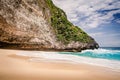 Classic tropical beach with no people. White sand and turquoise blue ocean and cliff in the water. Kelingking beach on Nusa Penida