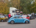 Classic tuned blue Volkswagen Beetle driving at a car show Royalty Free Stock Photo