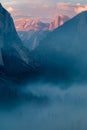 Classic Tunnel View of scenic Yosemite Valley with famous El Capitan and Half Dome rock climbing summits in beautiful atmosphere Royalty Free Stock Photo