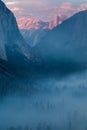 Classic Tunnel View of scenic Yosemite Valley with famous El Capitan and Half Dome rock climbing summits in beautiful atmosphere Royalty Free Stock Photo