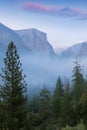 Classic Tunnel View of scenic Yosemite Valley with famous El Capitan and Half Dome rock climbing summits in beautiful Royalty Free Stock Photo