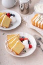 Classic vanilla or lemon pound cake served with fresh berries and whipped cream