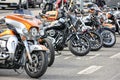 Classic Vespa, Harley Davidson, Famel XF, Piaggio, and Sachs V5 motorcycles on display on a street