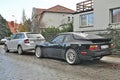 Classic veteran black old private sports car Porsche 944 Turbo Sport parked