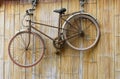 Bike decoration hanging ropes bamboo wall, Mai Chau, Vietnam