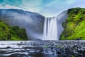 Classic view of famous Skogafoss waterfall in twilight, Iceland