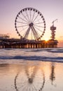 A classic view of the Pier and wheel of Scheveningen during sunset Royalty Free Stock Photo