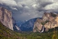 Classic view of scenic Yosemite Valley with famous El Capitan and Half Dome rock climbing summits and Bridal Vei waterfall, with a Royalty Free Stock Photo