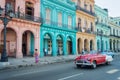 Classic vintage car and colorful colonial buildings in the main street of Old Havana Royalty Free Stock Photo