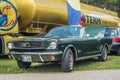 Classic vintage dark green Ford Mustang parked Royalty Free Stock Photo