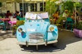 Classic vintage French car outside a resturant in Montpelleir Royalty Free Stock Photo