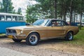 Classic vintage golden Ford Mustang parked Royalty Free Stock Photo