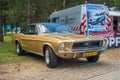 Classic vintage golden Ford Mustang parked Royalty Free Stock Photo