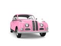 Classic vintage luxury car in candy pretty pink color - front view Royalty Free Stock Photo