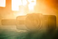 Classic vintage old 8mm movie camera on table with fog close up. Selective focus. Old Soviet Camera Royalty Free Stock Photo