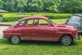 Classic vintage red Saab 96 two stroke motor parked