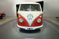 classic vintage red and white Volkswagen bus, automotive pop culture nostalgia 1960s, display Iconic show Volkswagen Group Forum