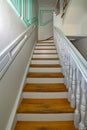 Classic vintage staircase in contemporary house. Wooden stairs in modern house Royalty Free Stock Photo