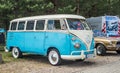 Classic vintage white and blue VW Transporter camper parked Royalty Free Stock Photo